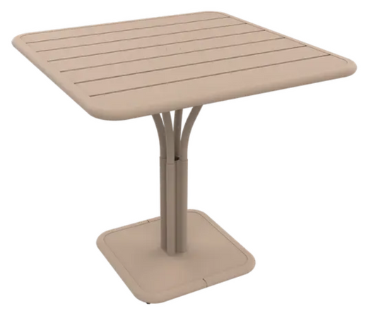Fermob Luxembourg outdoor pedestal table in nutmeg color, 80x80 cm with a modern design for outdoor dining or seating area.