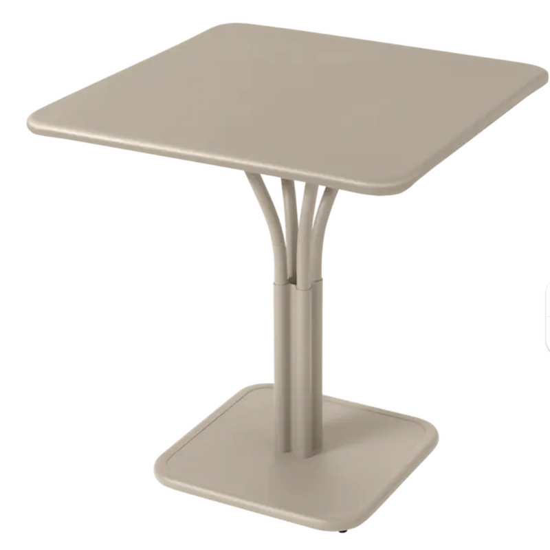 Load image into Gallery viewer, Fermob Luxembourg metal pedestal table with a solid nutmeg-colored aluminum top, ideal for outdoor restaurant or patio use.
