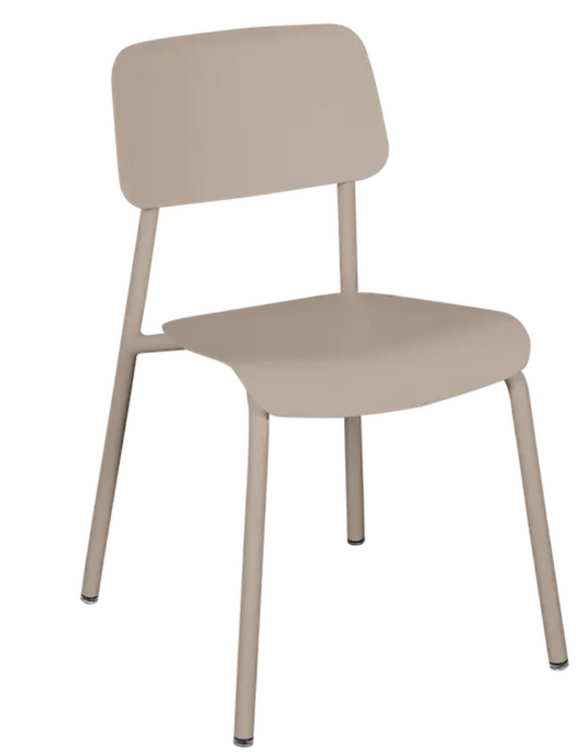 Fermob Nutmeg Studie outdoor chair with sleek metal frame and curved armrests, ideal for garden or patio seating.