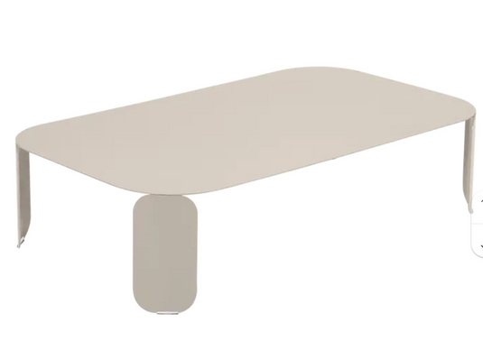 Fermob Bebop low outdoor table in nutmeg color, 120x70 cm, with a sleek design and H.42 cm height for garden or patio use.