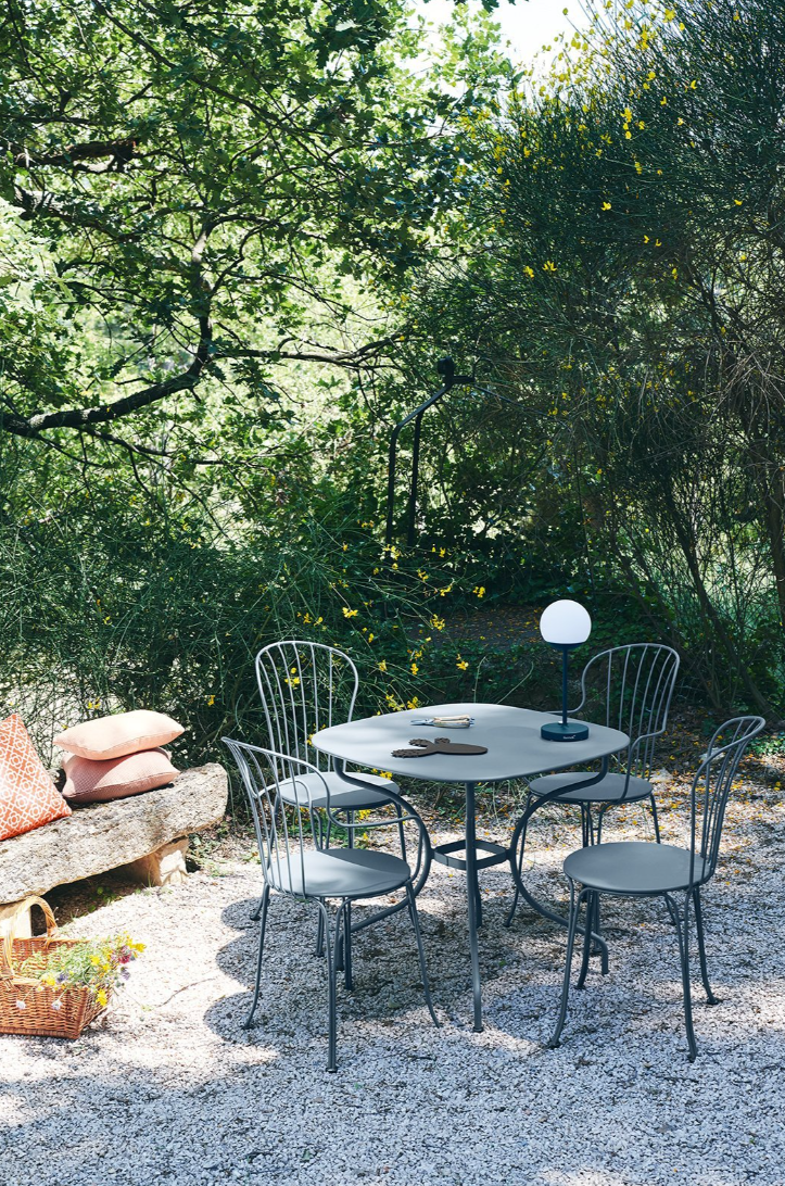 Load image into Gallery viewer, Fermob OPÉRA+ Carronde outdoor metal table measuring 82x82 cm, suitable for patio or garden seating areas.
