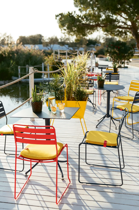 Fermob Surprising outdoor chair with colorful, modern design, suitable for patio or garden seating.