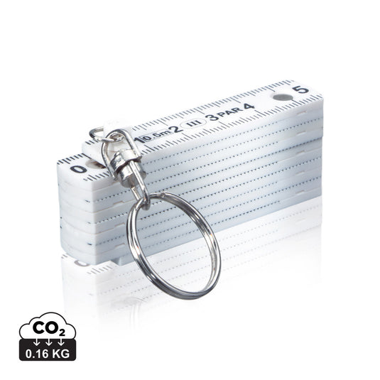 Mini folding rule from XD Collection Tools & Torches, showing its compact, foldable metal measuring tape with measurement markings.