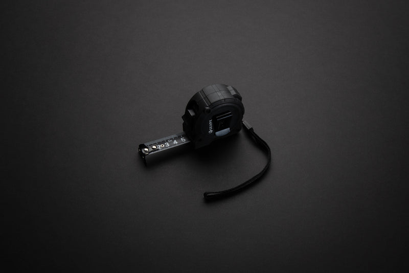 Load image into Gallery viewer, Gear X 5M measuring tape with slow/fast retract function, compact tools and torches, durable construction for precise measurements.
