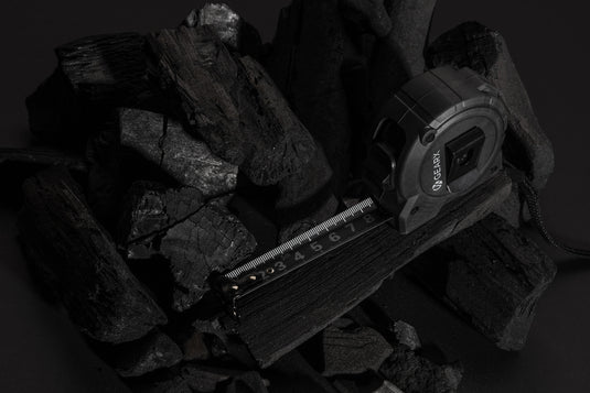 Gear X 5M measuring tape with slow and fast retract, durable tools and torches from GearX, featuring a metal tape and ergonomic grip.