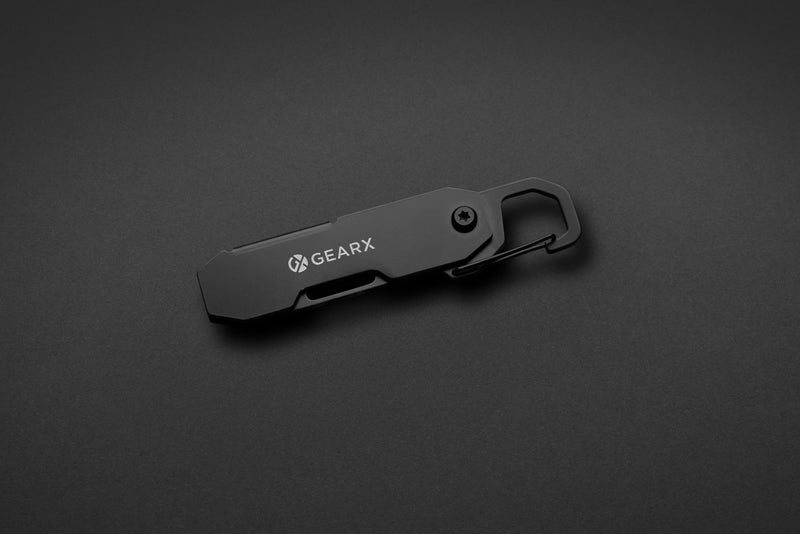 Load image into Gallery viewer, GearX foldable EDC tool with carabiner and parcel cutter, featuring compact design and versatile tools for everyday carry.
