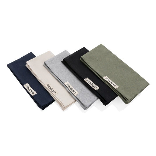 Set of four Ukiyo Aware™ 180g cotton table napkins with a textured, natural fabric finish for elegant dining decor.