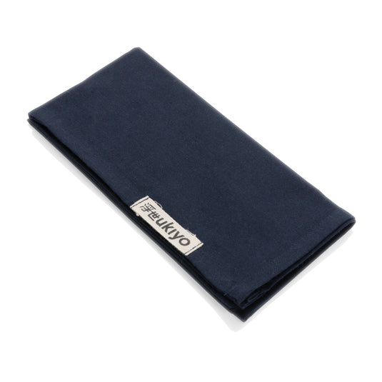Set of four Ukiyo Aware™ 180g cotton table napkins with a subtle textured pattern, ideal for home dining decor.