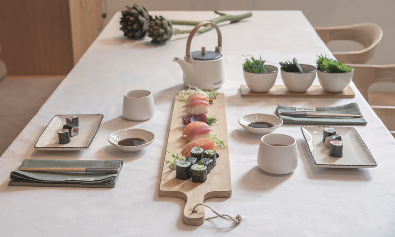 Load image into Gallery viewer, Set of four Ukiyo Aware™ 180g cotton table napkins with a soft, textured fabric, perfect for elegant dining and home decor.

