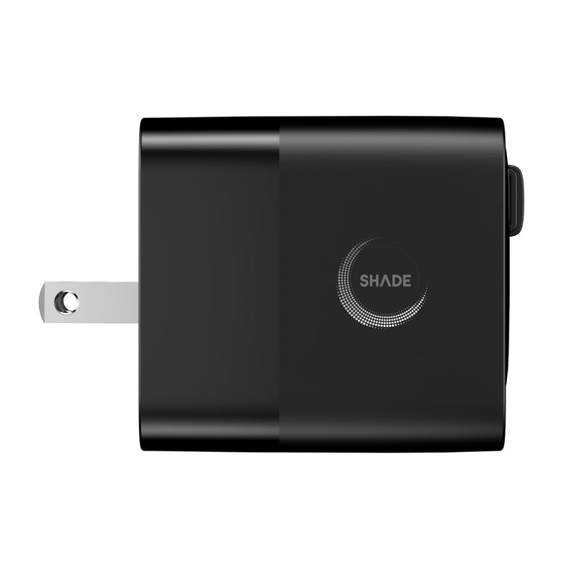 Load image into Gallery viewer, Urban Vitamin Mendocino 65W GaN charger with retractable cable for phones and tablets, compact and portable accessory.
