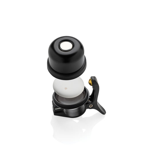 XD Collection Pedalfinder bike bell with worldwide locating feature, mounted on a bicycle handlebar, showcasing its sleek design.