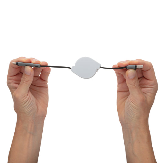 XD Collection 3-in-1 retractable cable for phone and tablet accessories, showing compact design and multiple connector options.