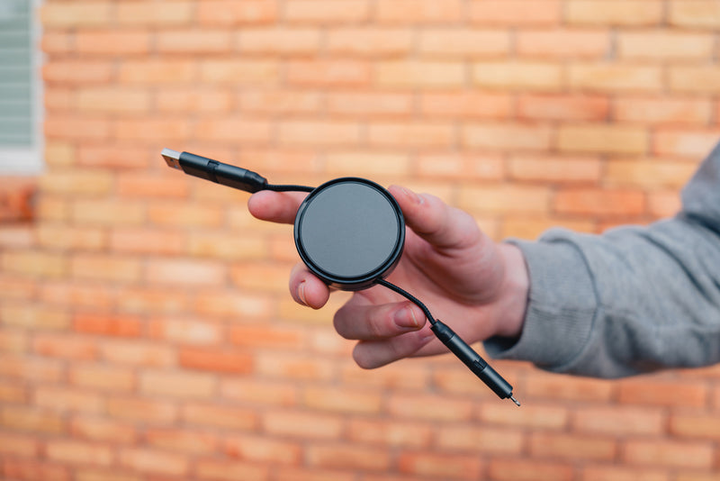 Load image into Gallery viewer, XD Xclusive Terra RCS recycled aluminium 6-in-1 45W retractable cable for phones and tablets, featuring multiple charging and data ports.
