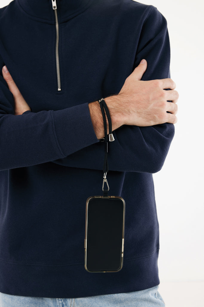 Load image into Gallery viewer, Recycled PET CarryLoop RCS adjustable phone holder wristlet by XD Collection, featuring a compact design with a secure strap.
