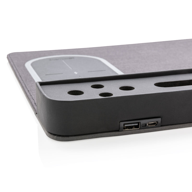 Load image into Gallery viewer, XD Xclusive air mousepad with wireless charging pad and USB port, designed for phones and tablets, shown on a workspace.
