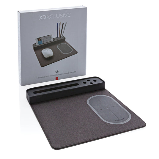 XD Xclusive air mousepad with 5W wireless charging and USB port, designed for phones and tablets, featuring a sleek surface.