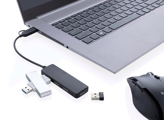 XD Collection RCS recycled plastic USB hub with dual input for phones and tablets, showcasing multiple USB ports on a sleek device.