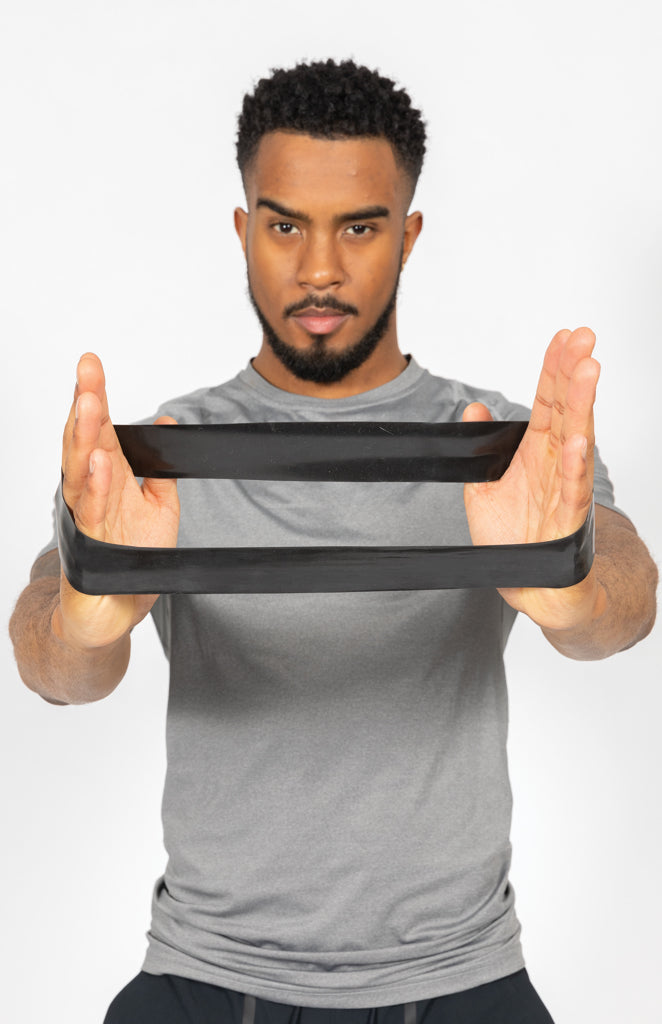 Load image into Gallery viewer, Set of four elastic fitness bands in a pouch by XD Collection, ideal for strength training and physical therapy exercises.
