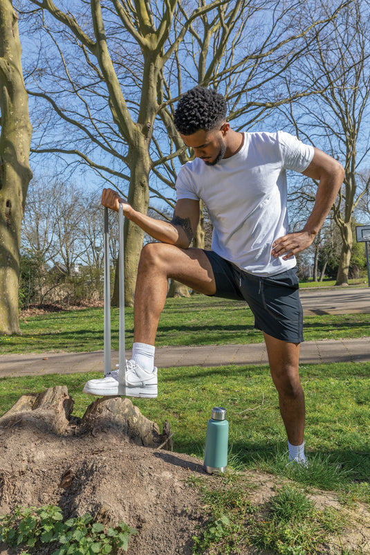 Set of four elastic fitness bands in a pouch by XD Collection, ideal for strength training and exercise routines.