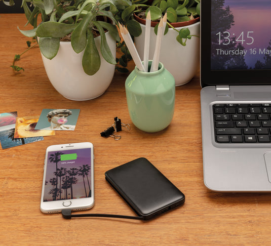 XD Collection 5,000 mAh pocket powerbank with integrated cables, compact phone and tablet charging accessory.