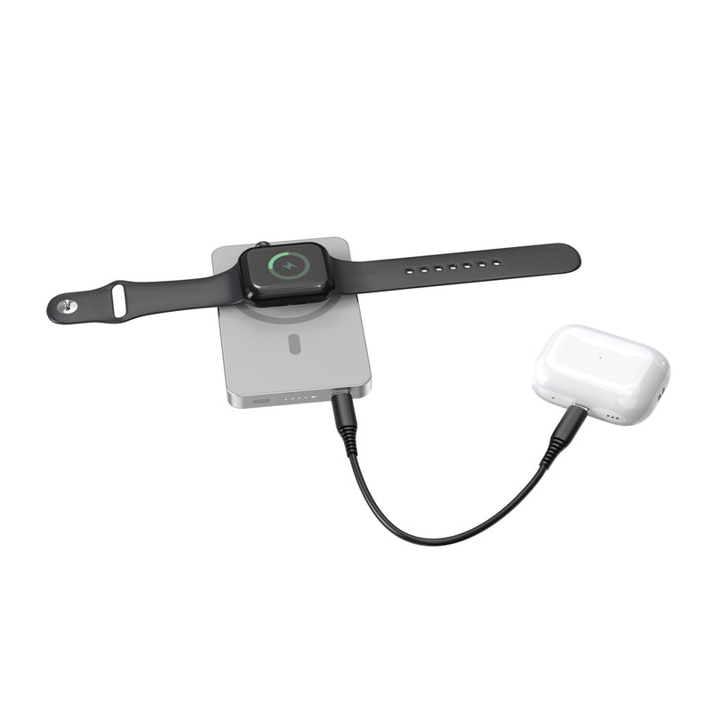 Load image into Gallery viewer, Urban Vitamin Marin 5000mAh magnetic wireless powerbank for phones and tablets with 15W fast charging, shown with magnetic attachment.
