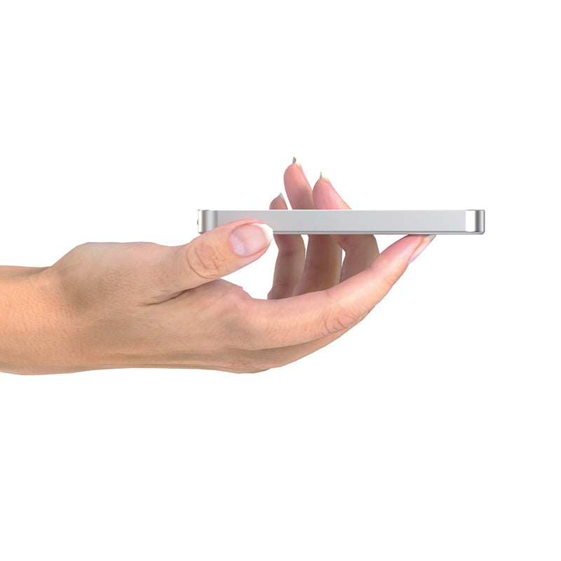 Load image into Gallery viewer, Urban Vitamin Marin 5000mAh magnetic wireless powerbank for phones and tablets, with 15W fast charging, black compact design.
