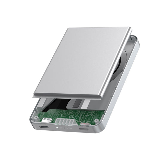Urban Vitamin Marin 5000mAh magnetic wireless powerbank for phones and tablets, with 15W fast charging, shown attached to a device.
