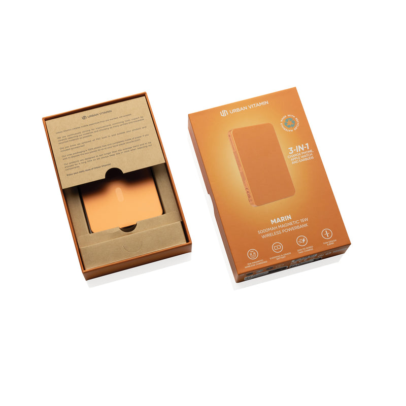 Load image into Gallery viewer, Urban Vitamin Marin 5000mAh magnetic wireless powerbank for phones and tablets, with 15W charging capability.
