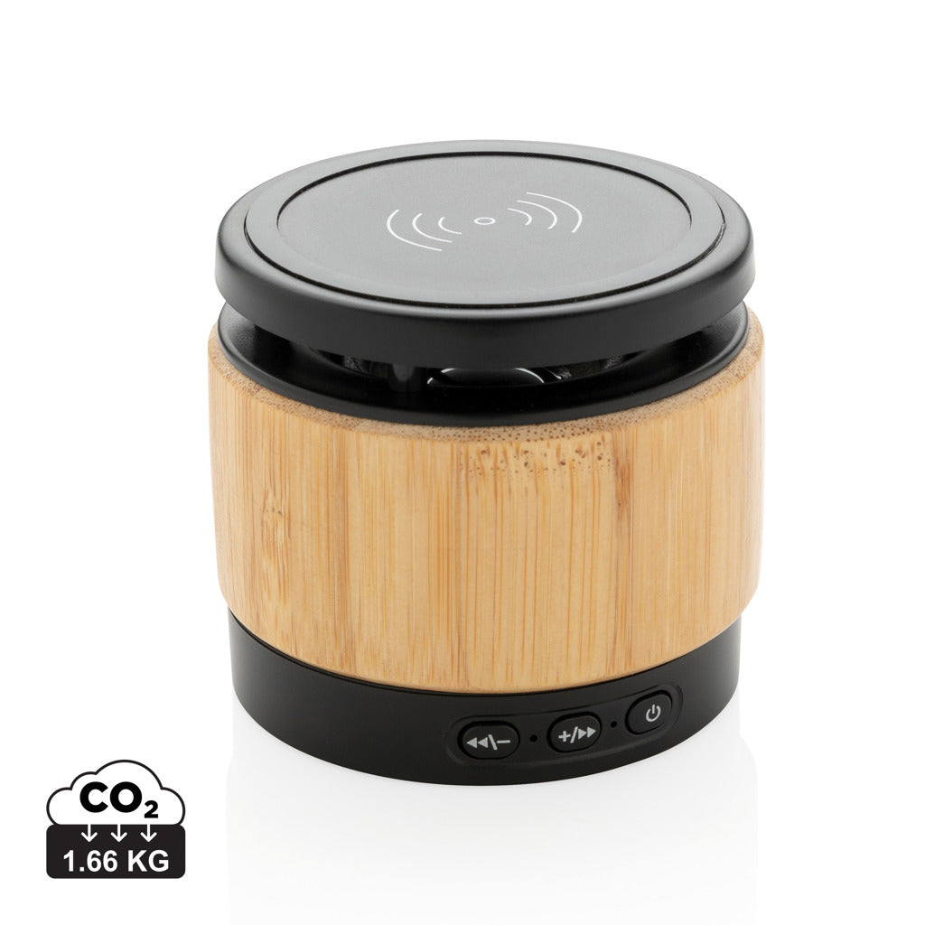 Bamboo wireless charger speaker by XD Collection featuring a sleek bamboo design and built-in audio speaker for charging and music.