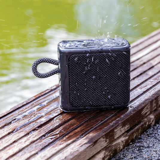 XD Collection Splash IPX6 3W portable audio speaker with water-resistant design and compact size for on-the-go listening.