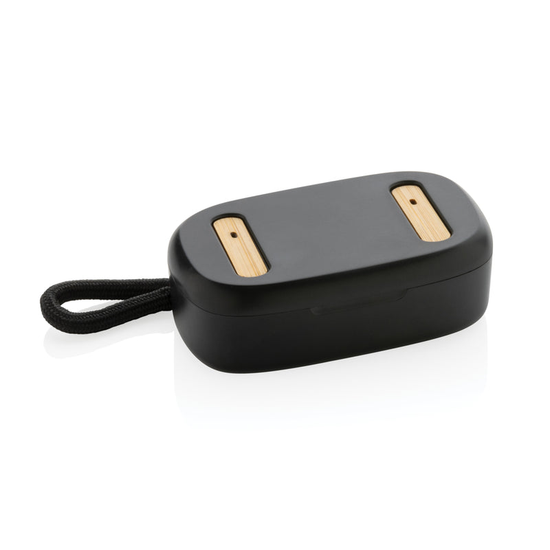 Load image into Gallery viewer, XD Collection RCS recycled plastic and bamboo TWS earbuds resting on a white surface, showcasing eco-friendly wireless audio design.
