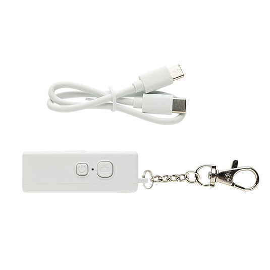 Recycled Cliq it RCS keychain camera attached to a phone, XD Xclusive phone and tablet accessory with compact design.