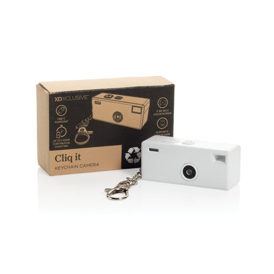 XD Xclusive Cliq it RCS recycled keychain camera attached to a phone, showcasing eco-friendly phone and tablet accessory design.