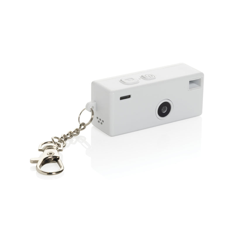 Load image into Gallery viewer, XD Xclusive Cliq it RCS recycled keychain camera attached to a phone, showcasing eco-friendly phone and tablet accessory design.
