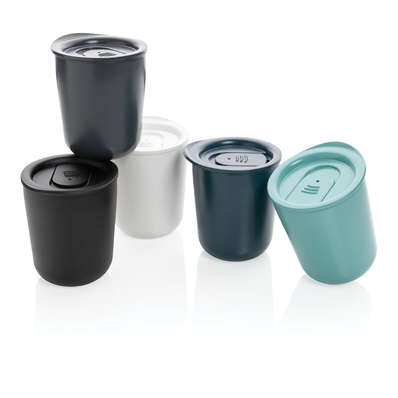 Load image into Gallery viewer, Simplistic antimicrobial coffee tumbler from XD Collection, showing a sleek drinkware design with a lid and textured finish.
