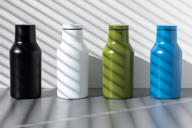 Load image into Gallery viewer, Recycled stainless steel compact bottle from XD Collection RCS drinkware with a sleek design on a white background.

