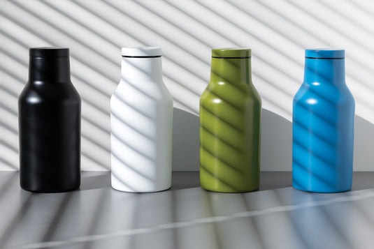 Recycled stainless steel compact bottle from XD Collection drinkware line, featuring a sleek, eco-friendly design.