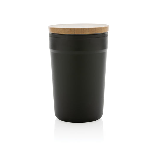 Reusable GRS certified recycled polypropylene mug with bamboo lid from XD Collection for eco-friendly drinking.