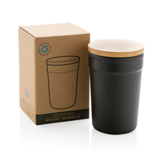 Reusable GRS certified recycled polypropylene mug with bamboo lid, part of XD Collection drinkware, in natural setting.