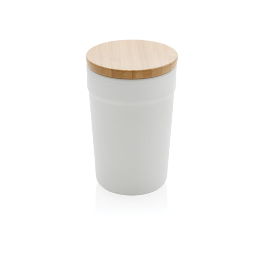 Recycled polypropylene mug with bamboo lid from XD Collection, eco-friendly drinkware for hot or cold beverages.