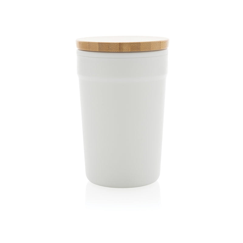 Load image into Gallery viewer, Reusable GRS certified recycled polypropylene mug with bamboo lid from XD Collection, eco-friendly drinkware for everyday use.
