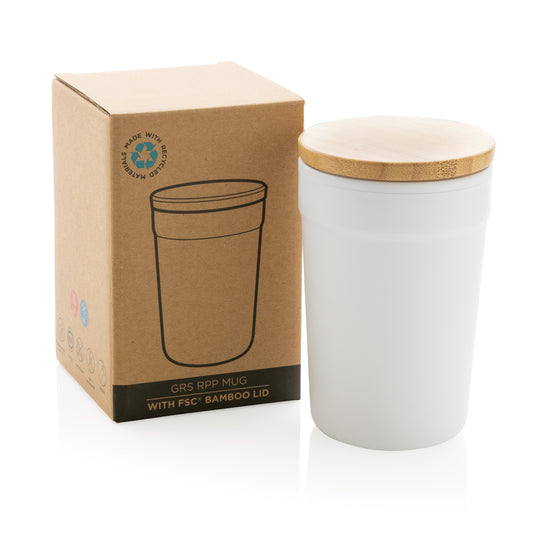 Recycled polypropylene mug with bamboo lid from XD Collection, eco-friendly drinkware for hot or cold beverages.