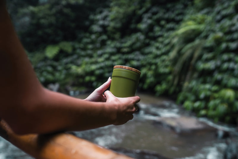 Load image into Gallery viewer, Recycled polypropylene mug with bamboo lid from XD Collection, eco-friendly drinkware featuring a sleek design and secure lid.
