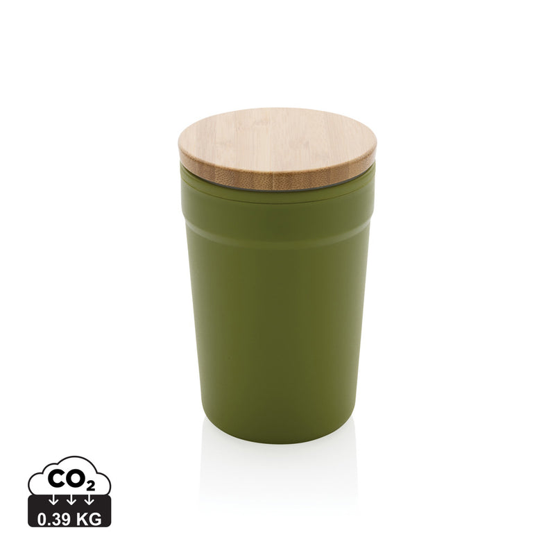 Load image into Gallery viewer, Recycled PP mug with bamboo lid from XD Collection, eco-friendly drinkware perfect for hot or cold beverages.
