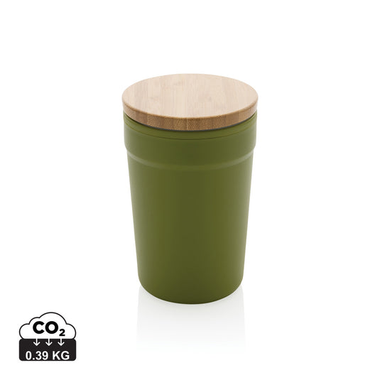 Recycled PP mug with bamboo lid from XD Collection, eco-friendly drinkware perfect for hot or cold beverages.