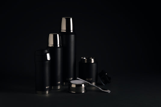 Swiss Peak Elite copper vacuum mug shown with sleek stainless steel design and secure lid, perfect for hot or cold drinks.