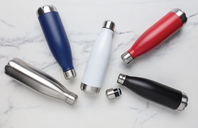 Load image into Gallery viewer, Stainless steel vacuum-insulated bottle from XD Collection, drinkware with a sleek design and secure lid for hot or cold beverages.
