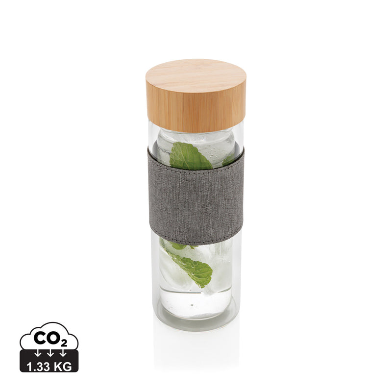 Load image into Gallery viewer, Double wall borosilicate glass bottle from XD Collection, sleek drinkware with insulation and clear design.
