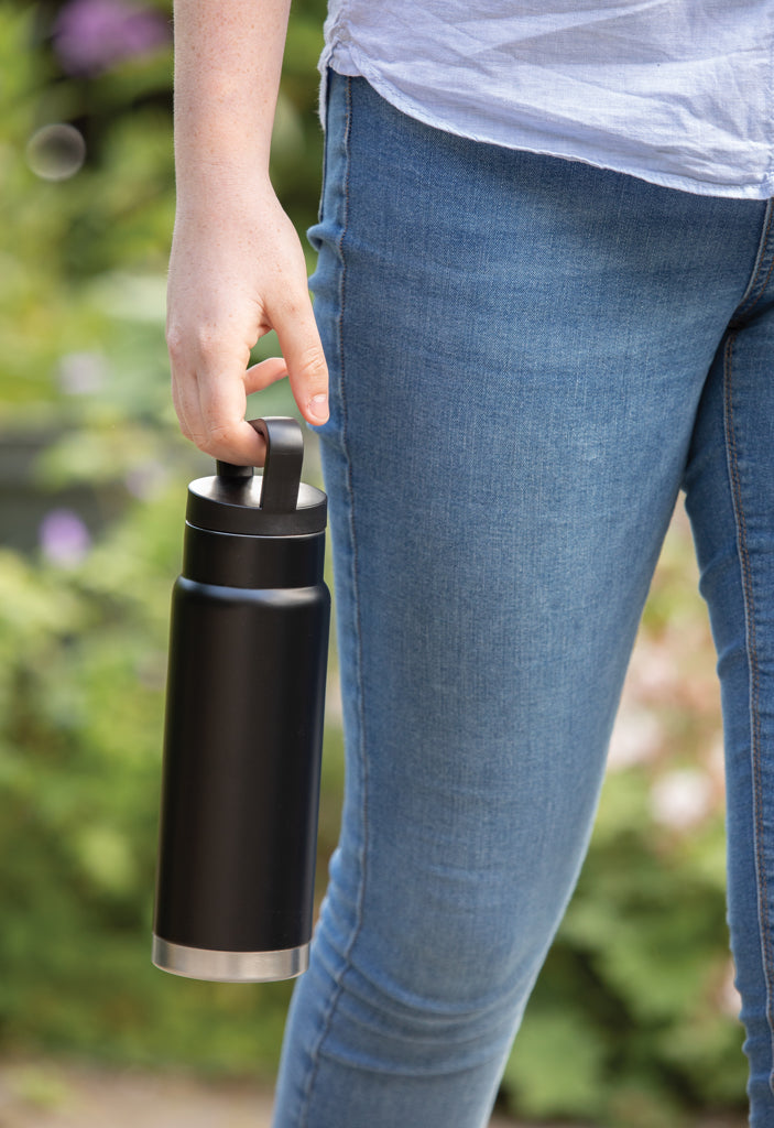 Load image into Gallery viewer, Leakproof vacuum on-the-go bottle with handle from XD Collection, showing sleek drinkware design with secure lid and ergonomic handle.
