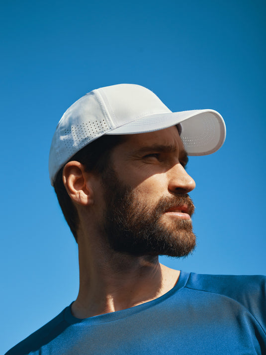 Impact AWARE™ RPET 6-panel sports cap by XD Collection featuring eco-friendly recycled PET fabric and a classic athletic design.